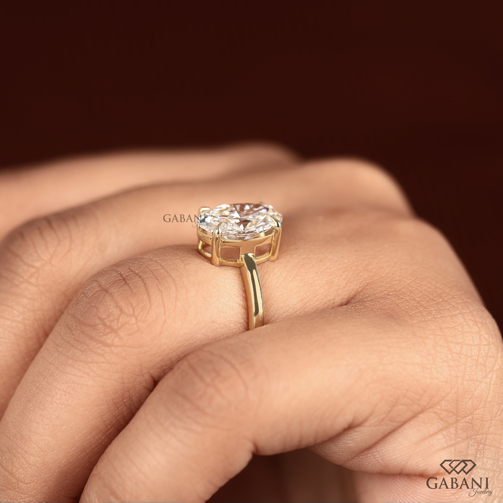 promise ring with oval lab grown diamond in gold
