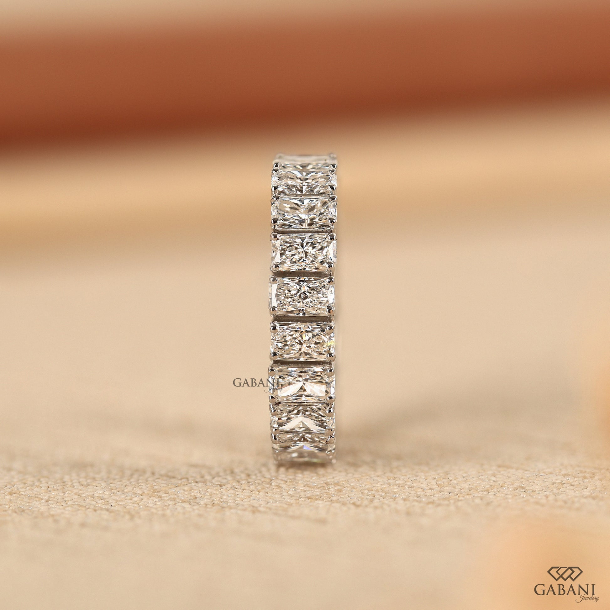 Solid white gold full eternity band with certified lab grown radiant diamonds
