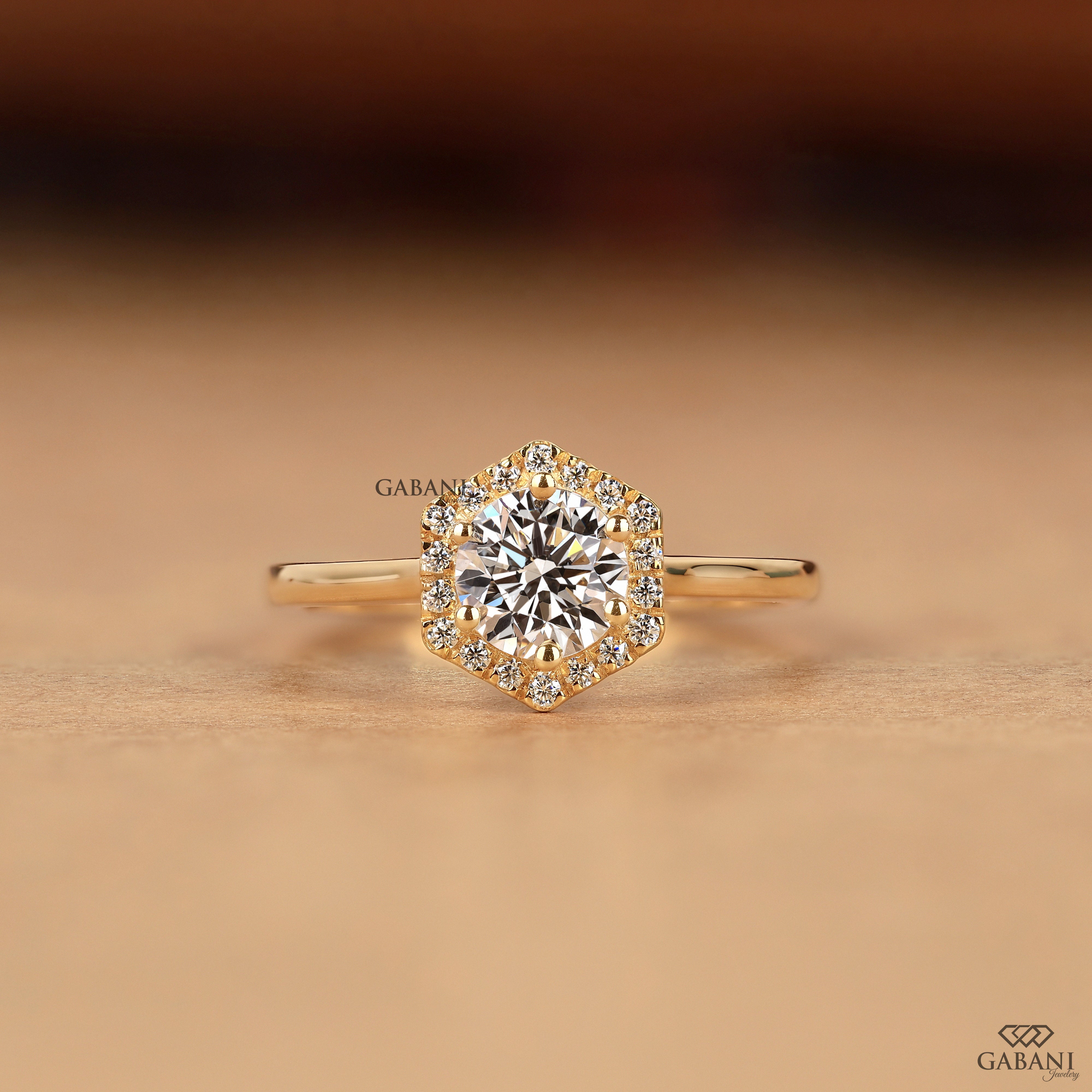 Round cut lab grown diamond engagement ring with hexagon halo, yellow gold band, IGI certified EF color and VS1 clarity.