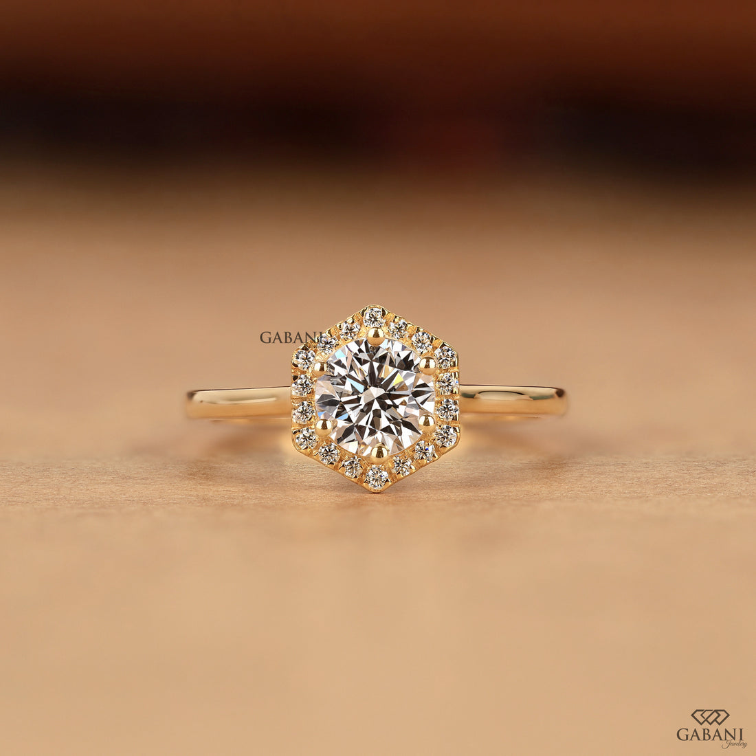 Round cut lab grown diamond engagement ring with hexagon halo, yellow gold band, IGI certified EF color and VS1 clarity.