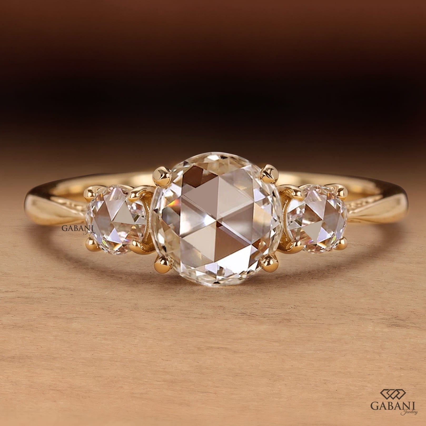 Round rose cut lab grown diamond three stone engagement ring with matching side diamonds, classic prong setting and vintage inspired design.