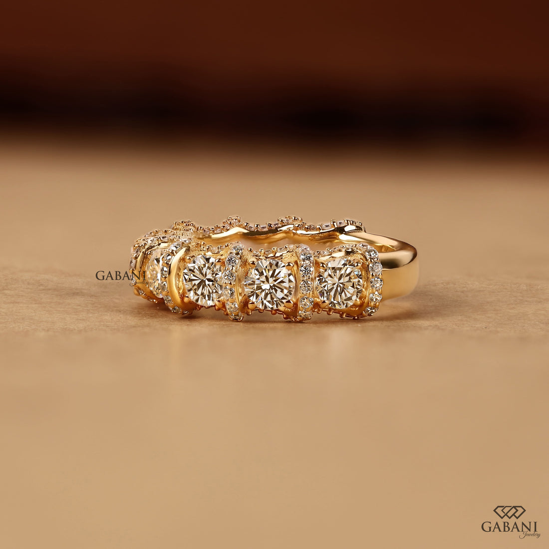 Five stone round cut lab grown diamond wedding band in yellow gold with diamond accent setting, designed for bridal, anniversary and stackable wear.