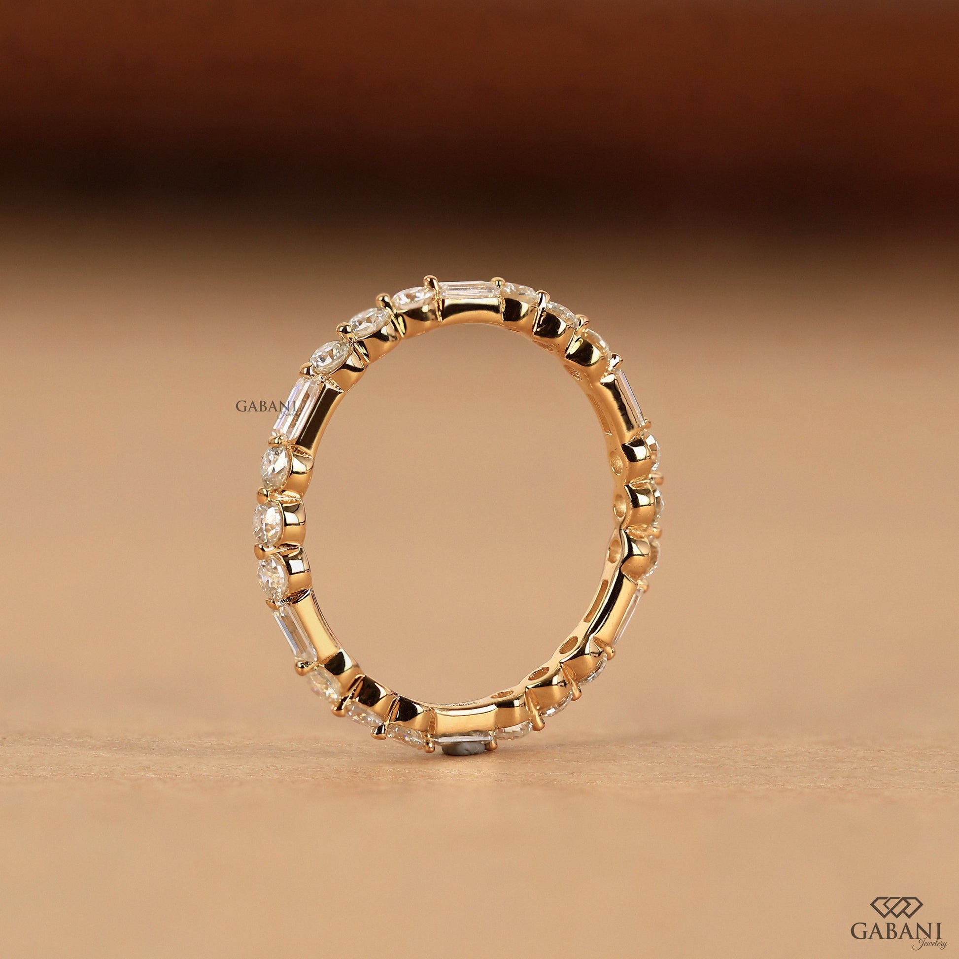 minimal 14k yellow gold eternity band with lab grown baguette and round diamonds