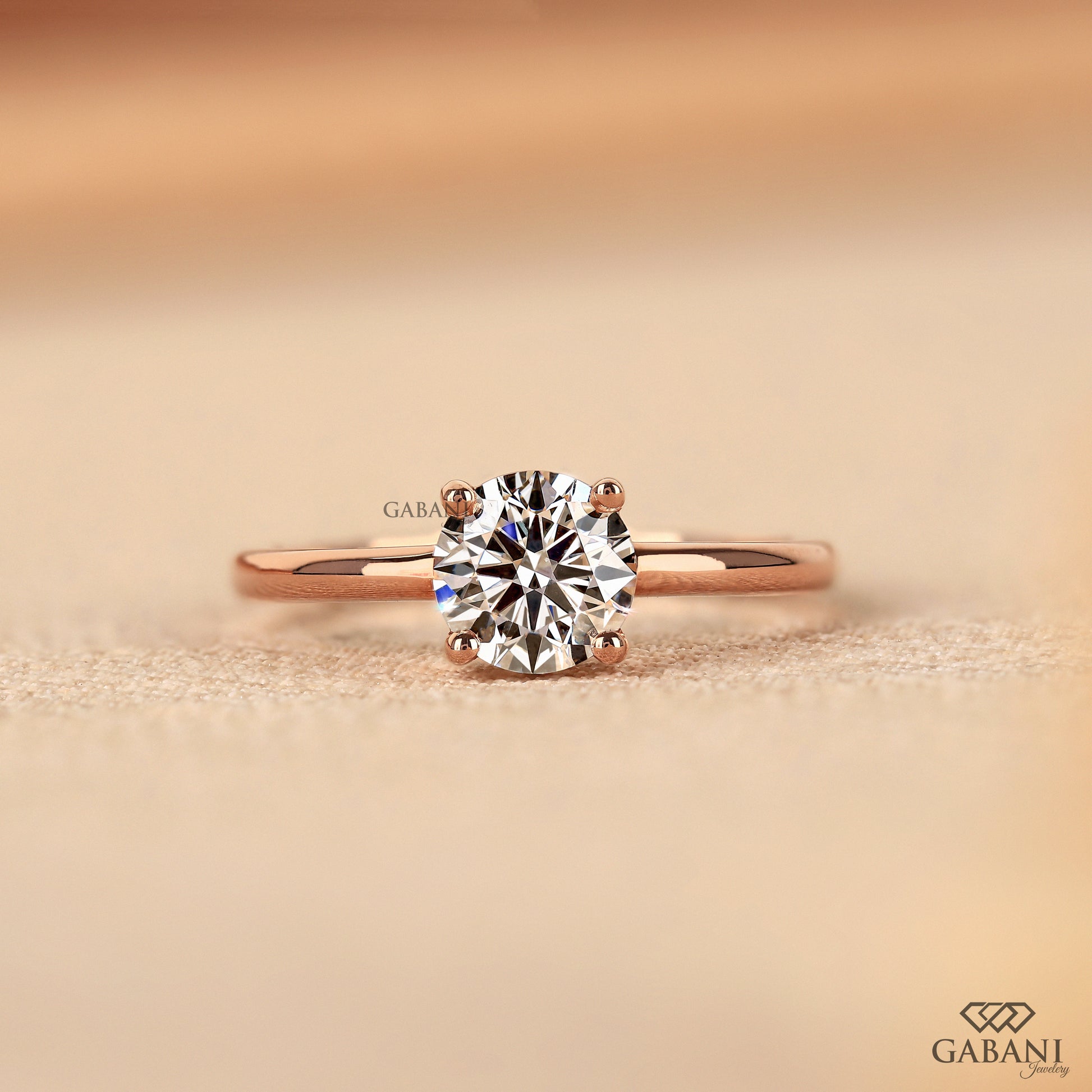 round cut lab grown diamond solitaire ring in 14k rose gold with slim band
