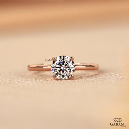 round cut lab grown diamond solitaire ring in 14k rose gold with slim band
