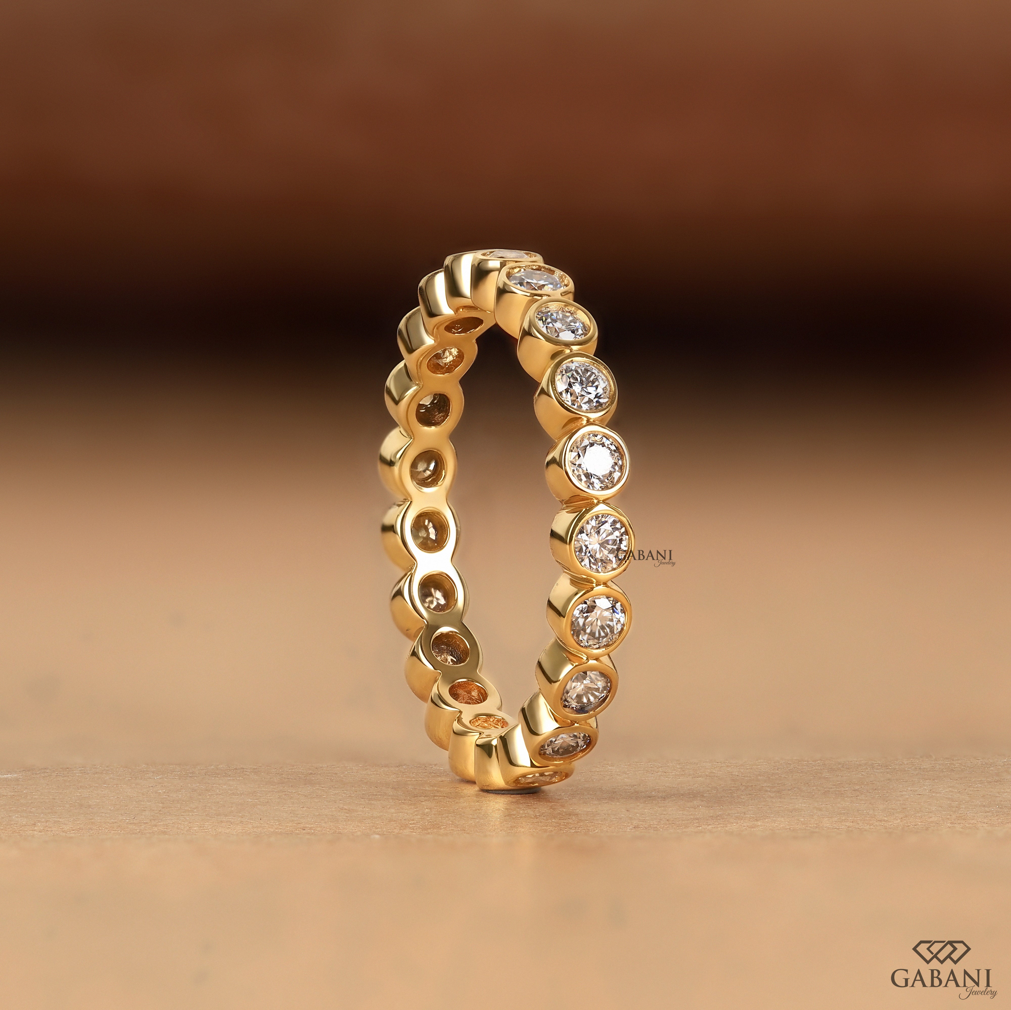 Bezel set round diamond eternity band