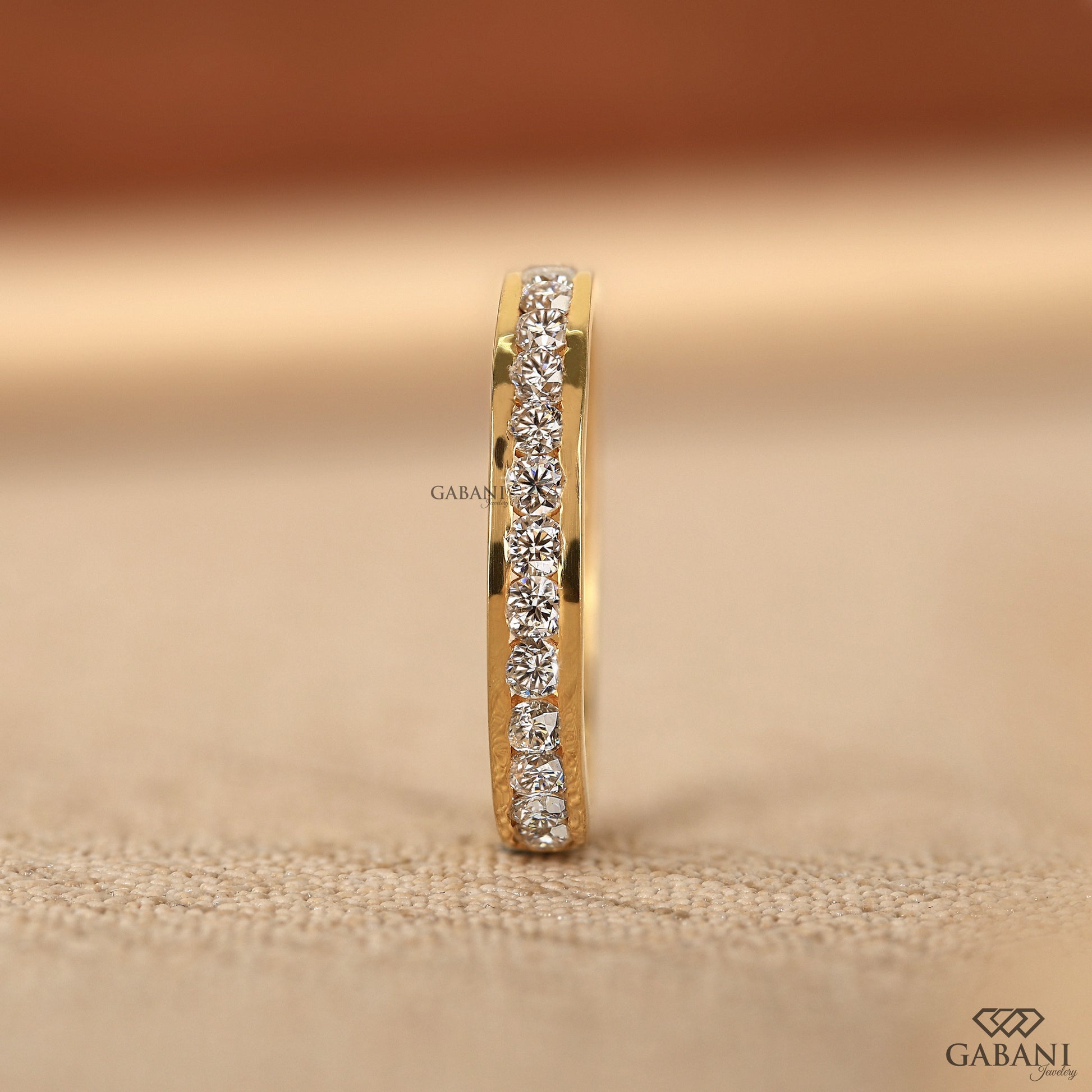 round lab grown diamond channel set ring in 14k yellow gold comfort fit