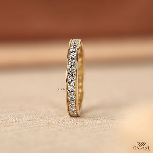 round cut lab grown diamond eternity band in solid yellow gold