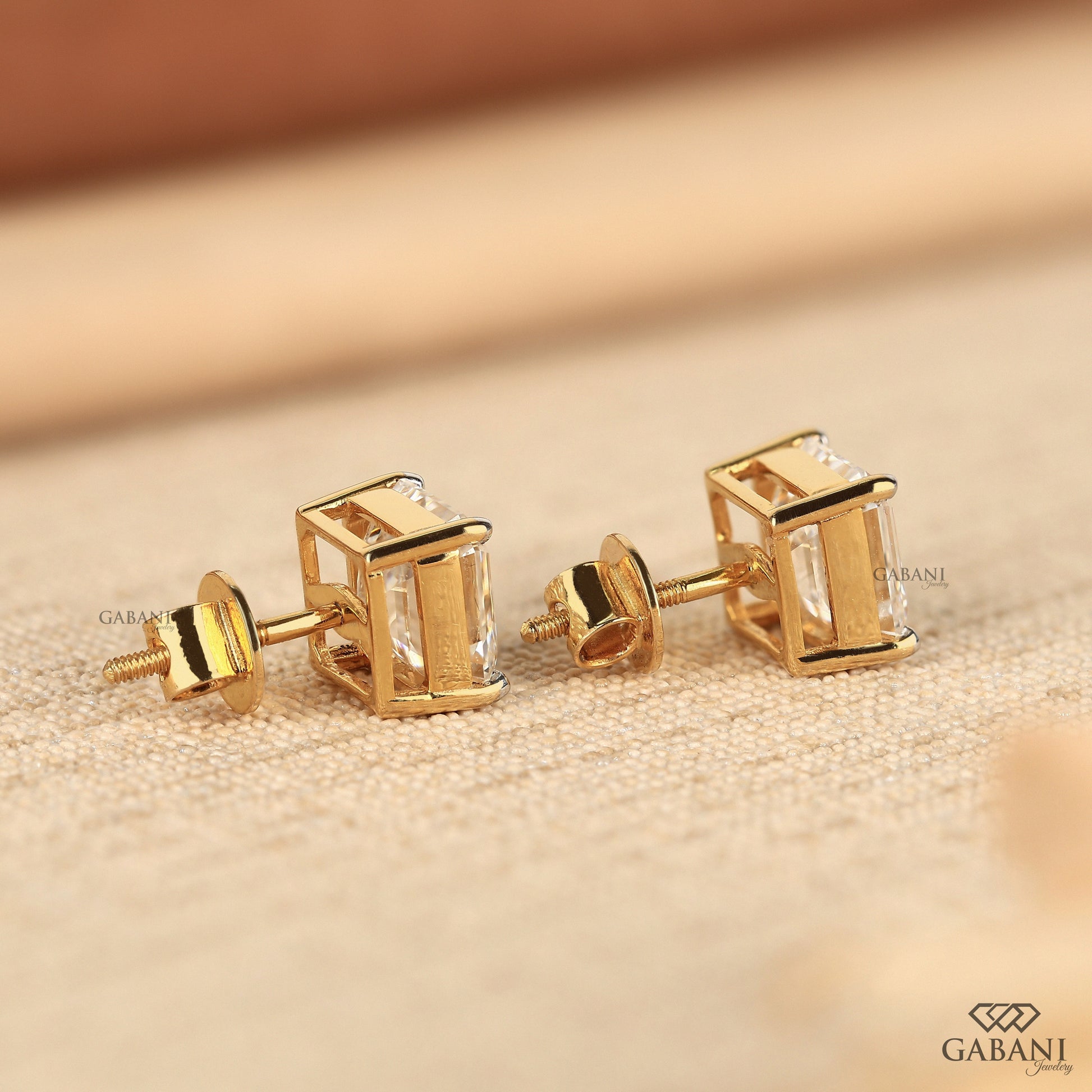Yellow gold lab grown diamond stud earrings with Asscher cut and clean geometric style
