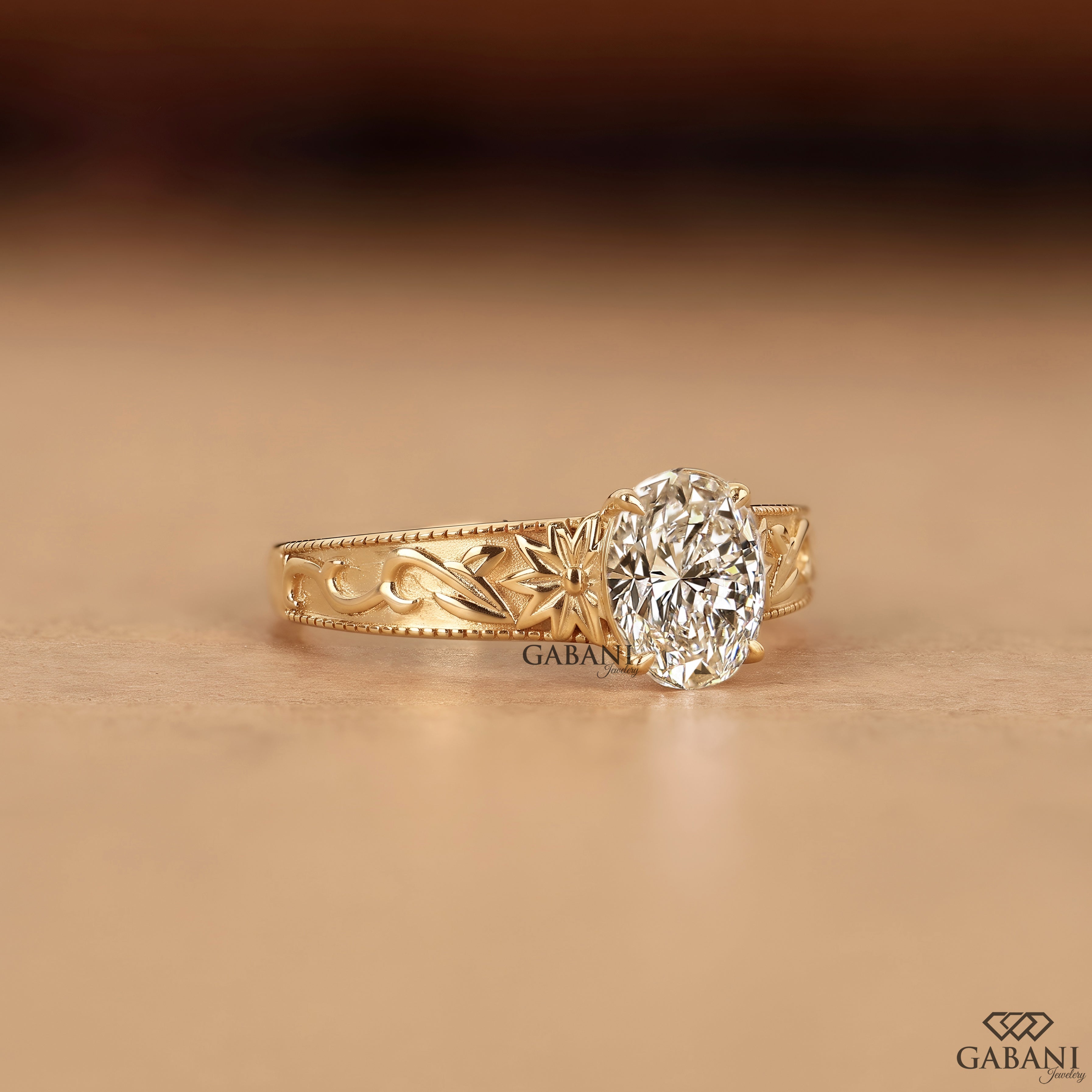 Oval cut lab grown diamond proposal ring with engraved leaf details