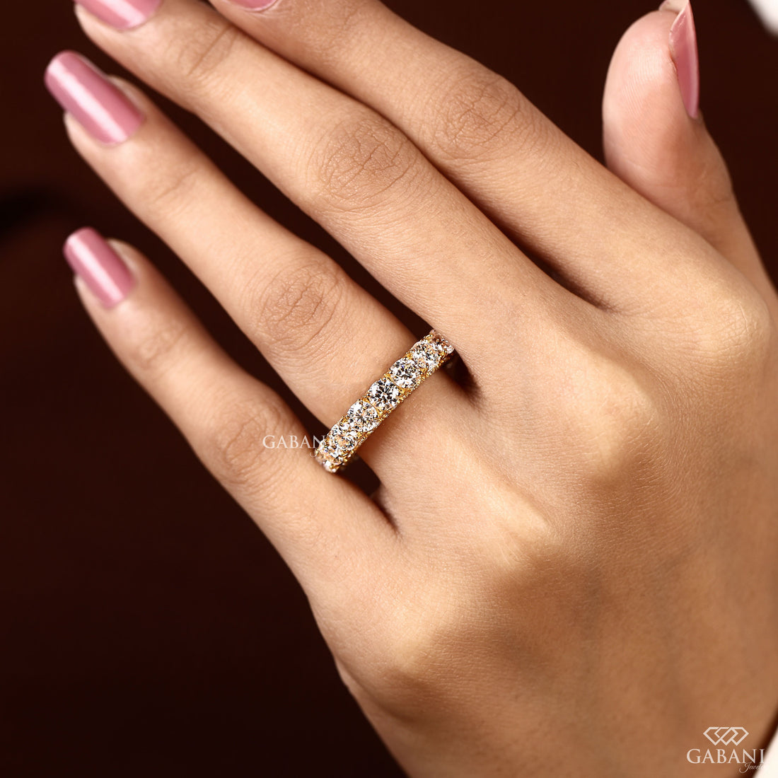Round cut lab grown diamond full eternity band in yellow gold with continuous diamonds and side accent stones, designed for wedding, anniversary, bridal, and stackable wear.