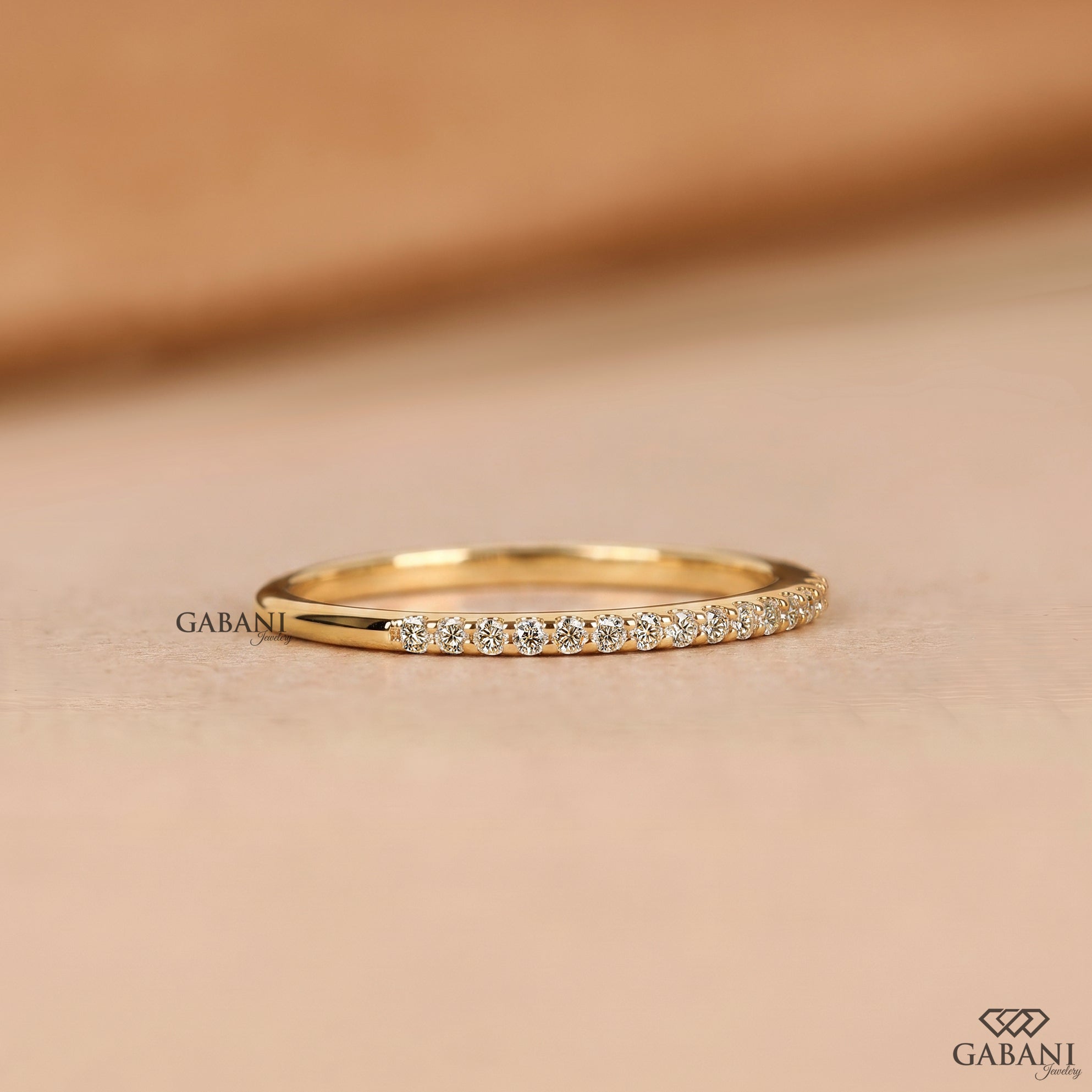 Pave diamond half eternity band with a delicate wedding ring style