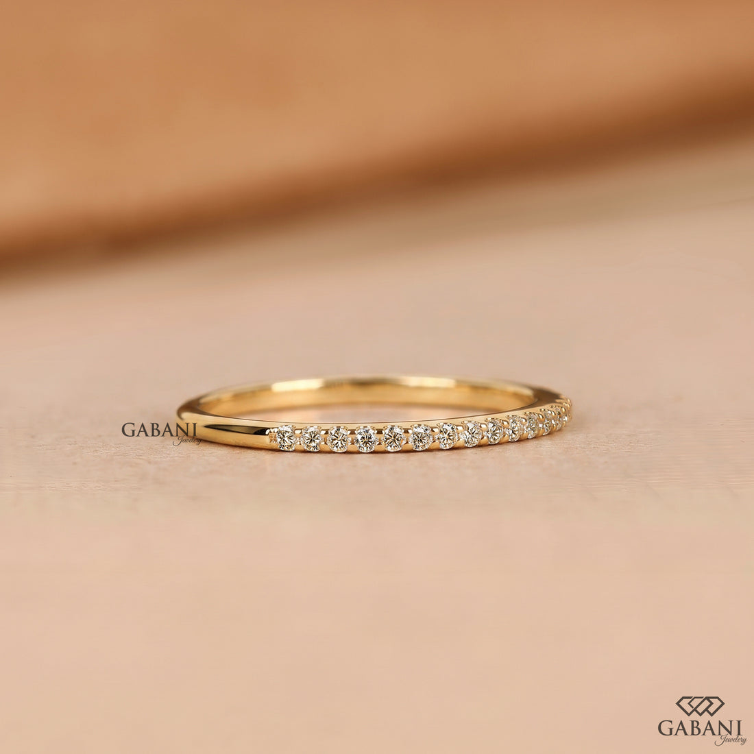 Pave diamond half eternity band with a delicate wedding ring style