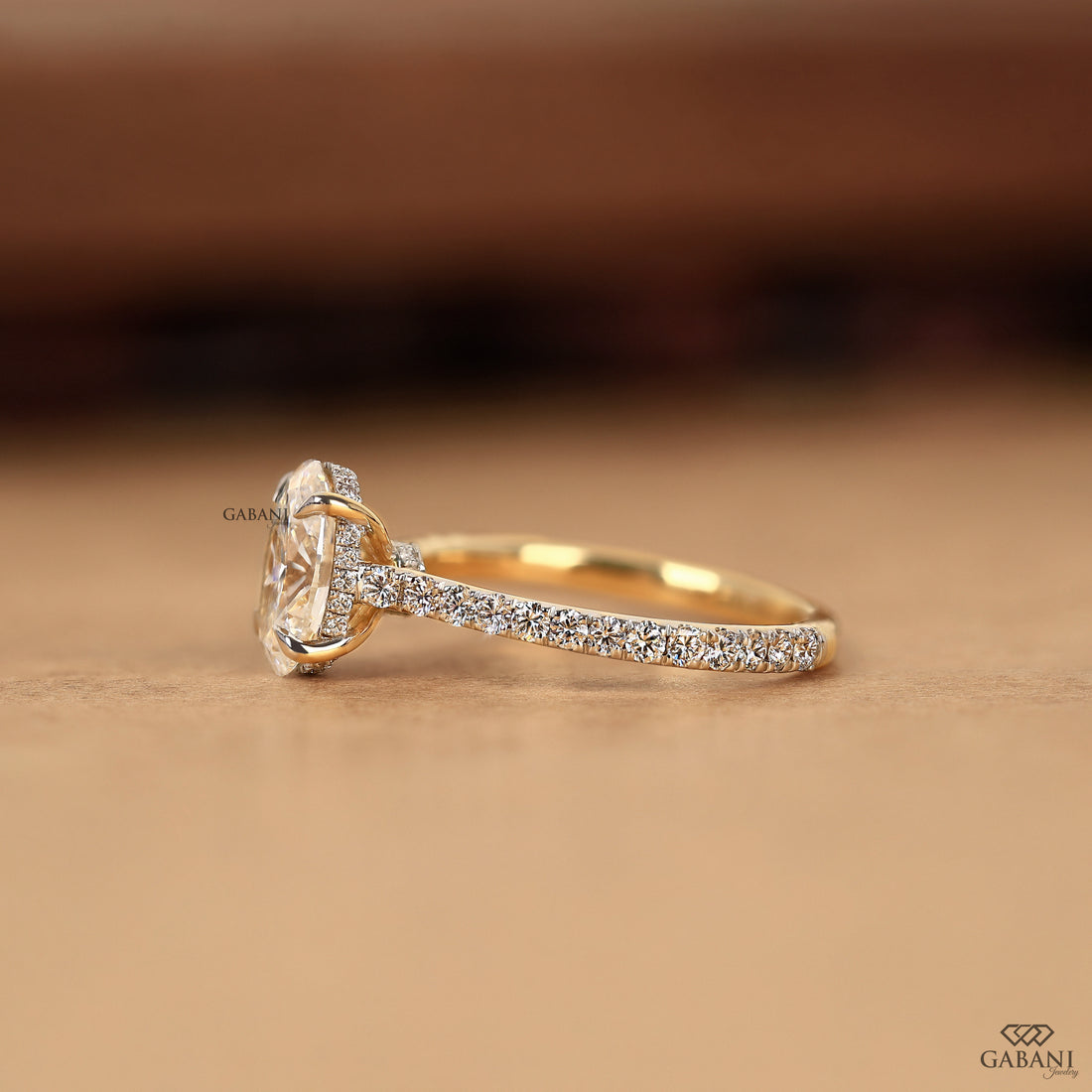 Lab grown oval diamond engagement ring with hidden halo