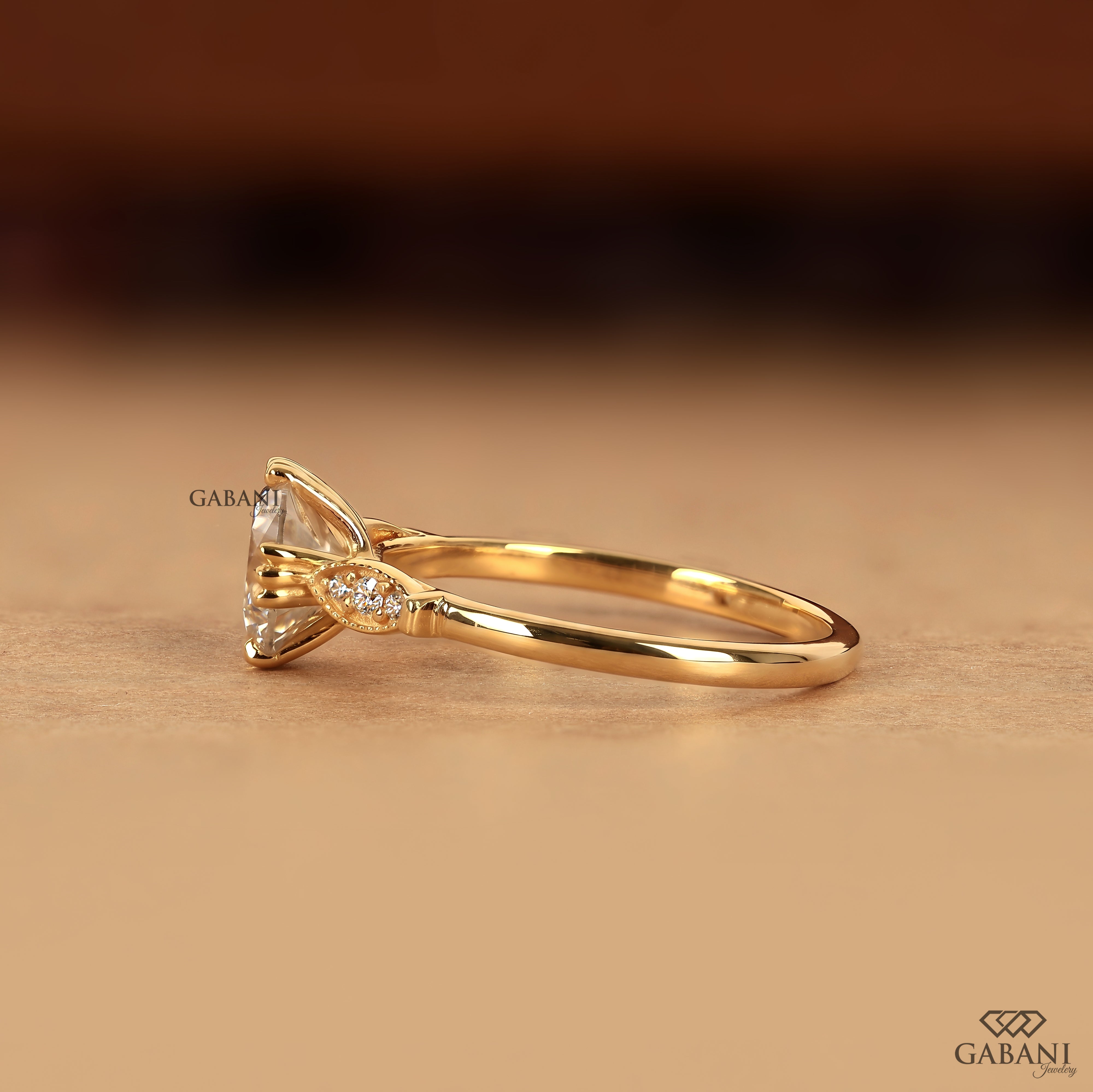 Side view of round brilliant lab grown diamond engagement ring with milgrain side diamonds