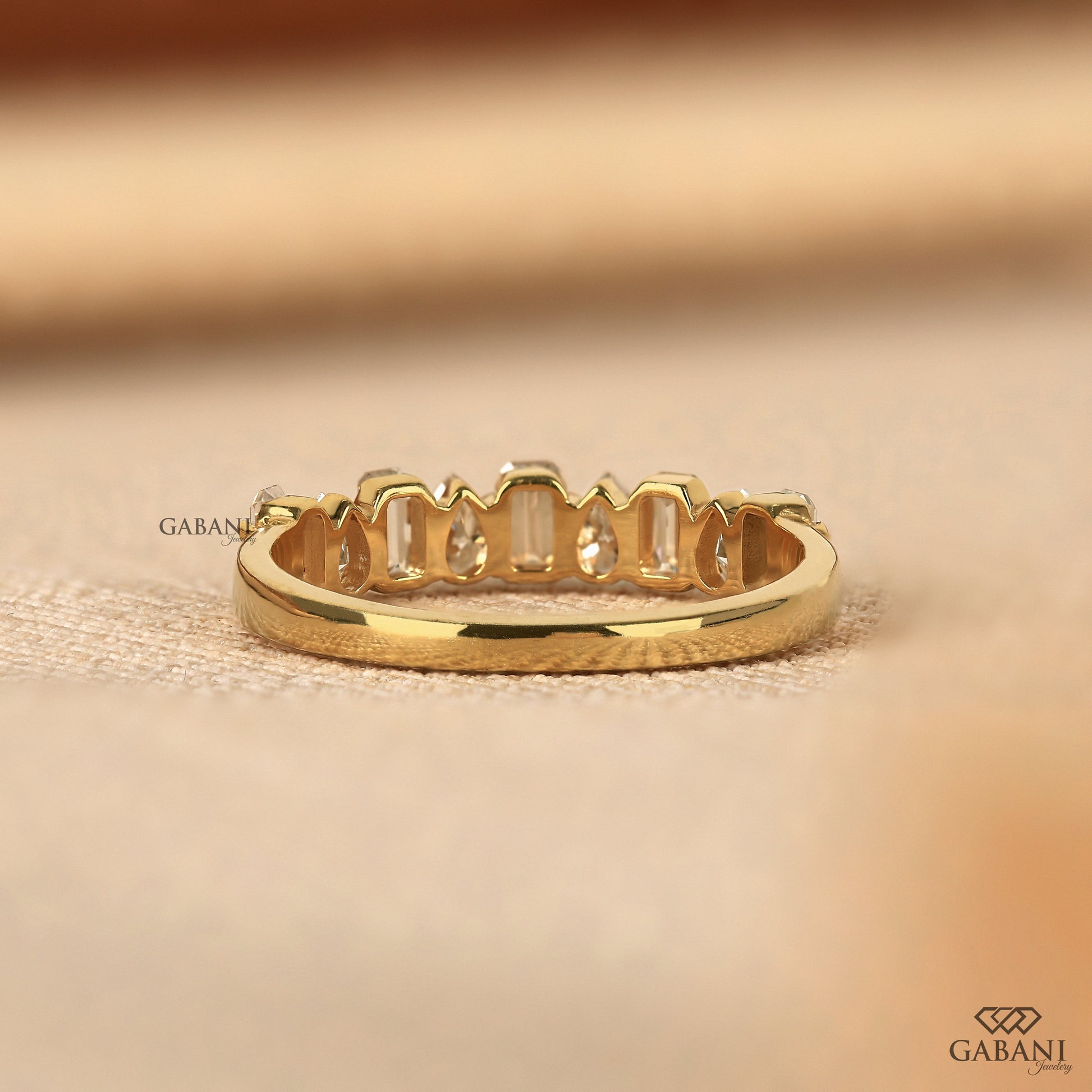 emerald pear diamond band designed for stacking in solid yellow gold