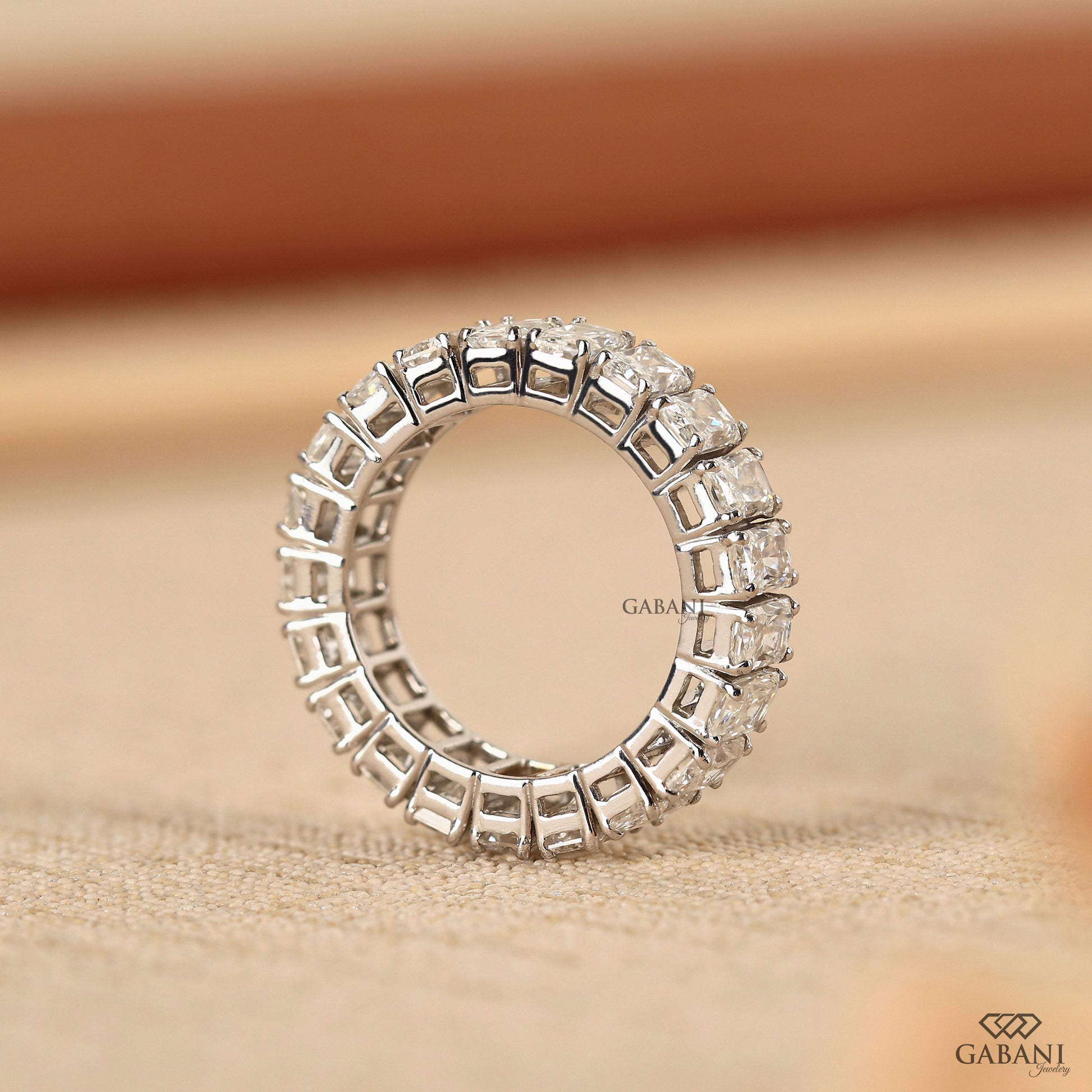 Radiant cut diamond wedding ring in white gold with thick band design