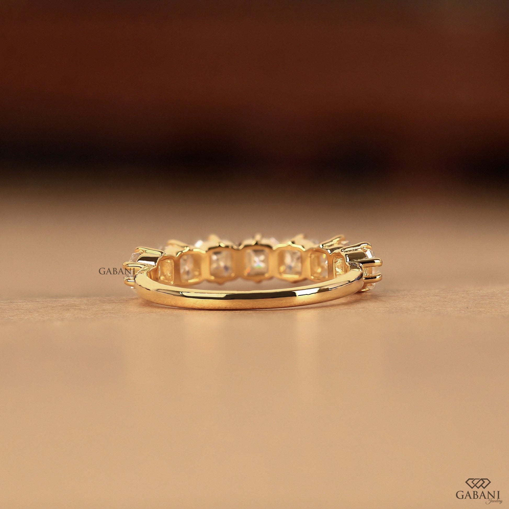 Compass set lab grown diamond band in yellow gold