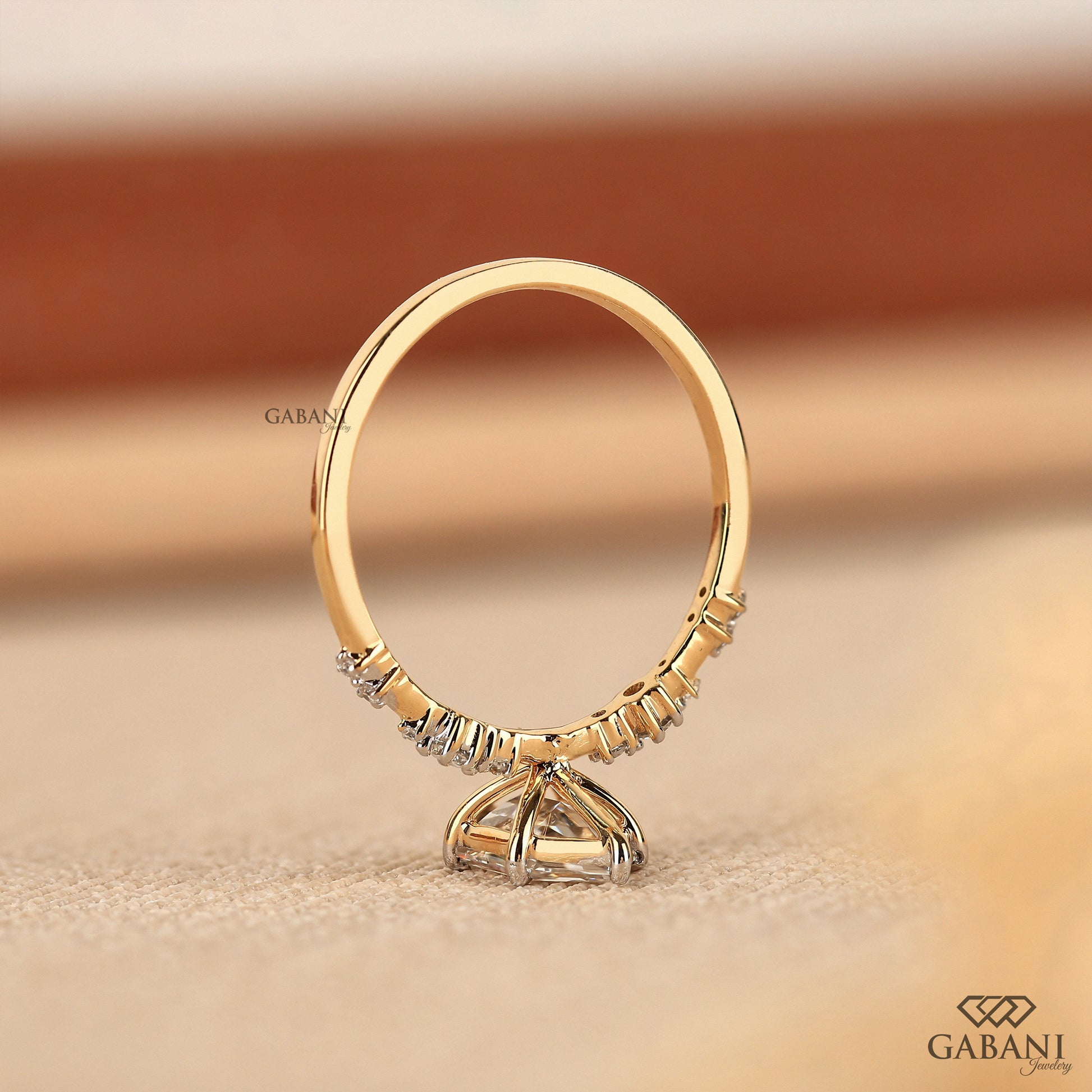 18k gold engagement ring with hexagon lab created diamond and side round stones