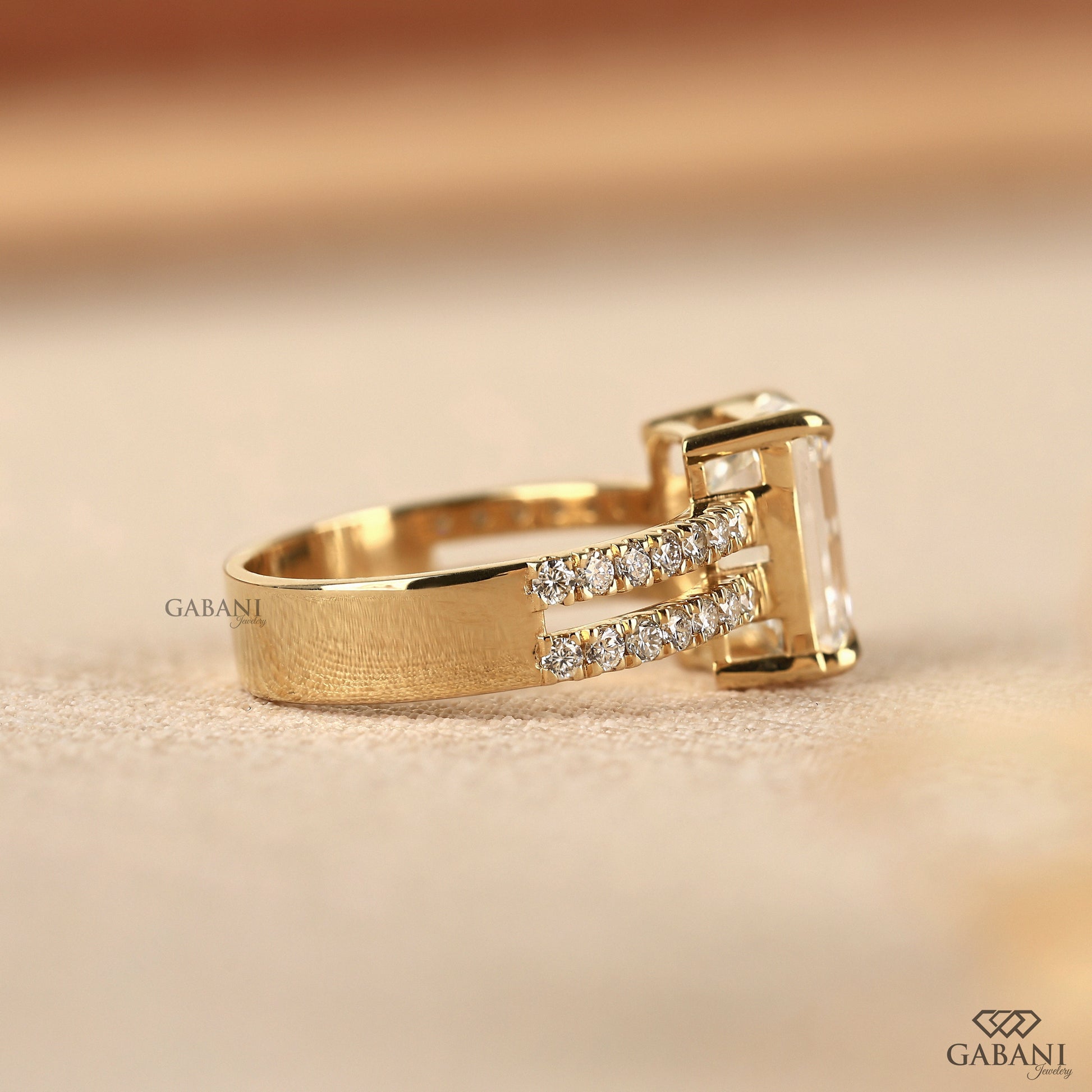 Emerald cut lab diamond ring with secure claw prong setting
