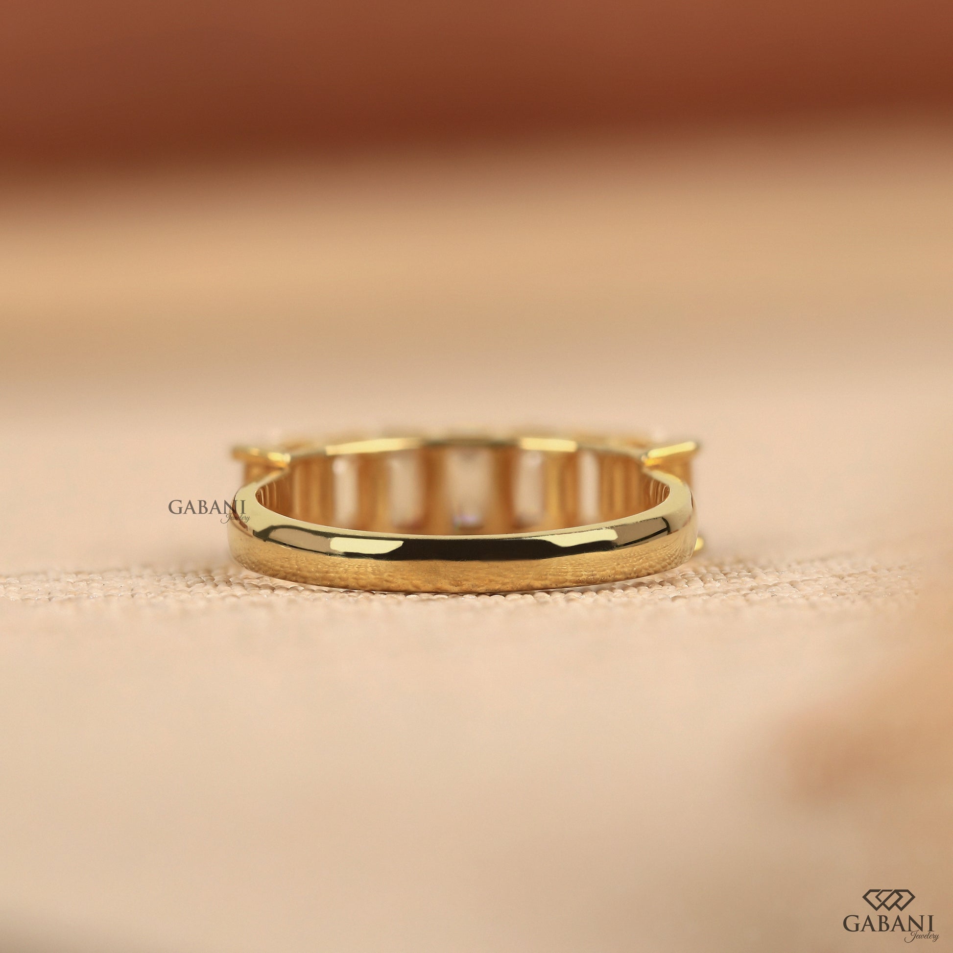 Solid yellow gold emerald cut lab grown diamond wedding band