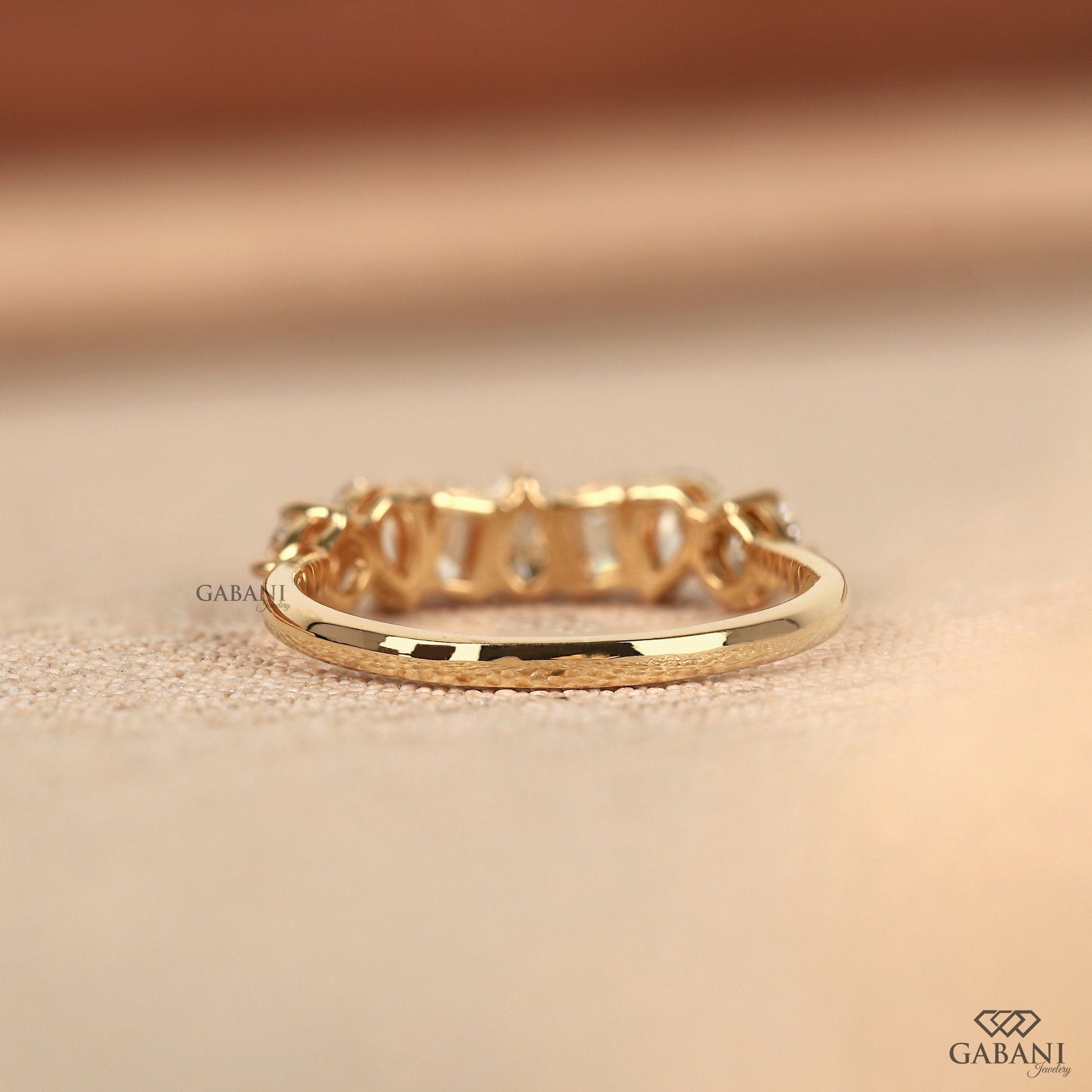 Multi stone lab grown diamond band with slim low profile design in yellow gold