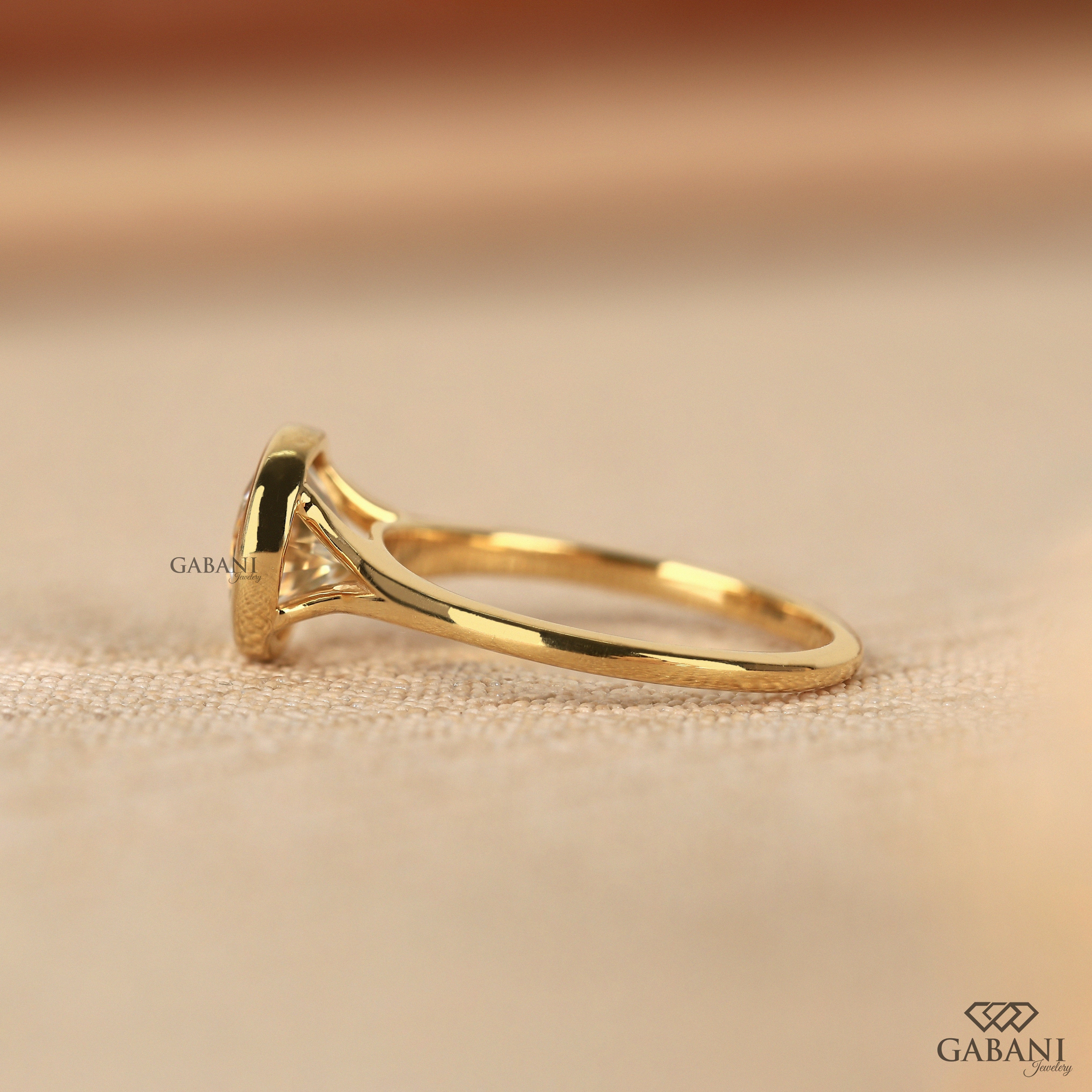 Round cut lab grown diamond solitaire ring with bezel setting