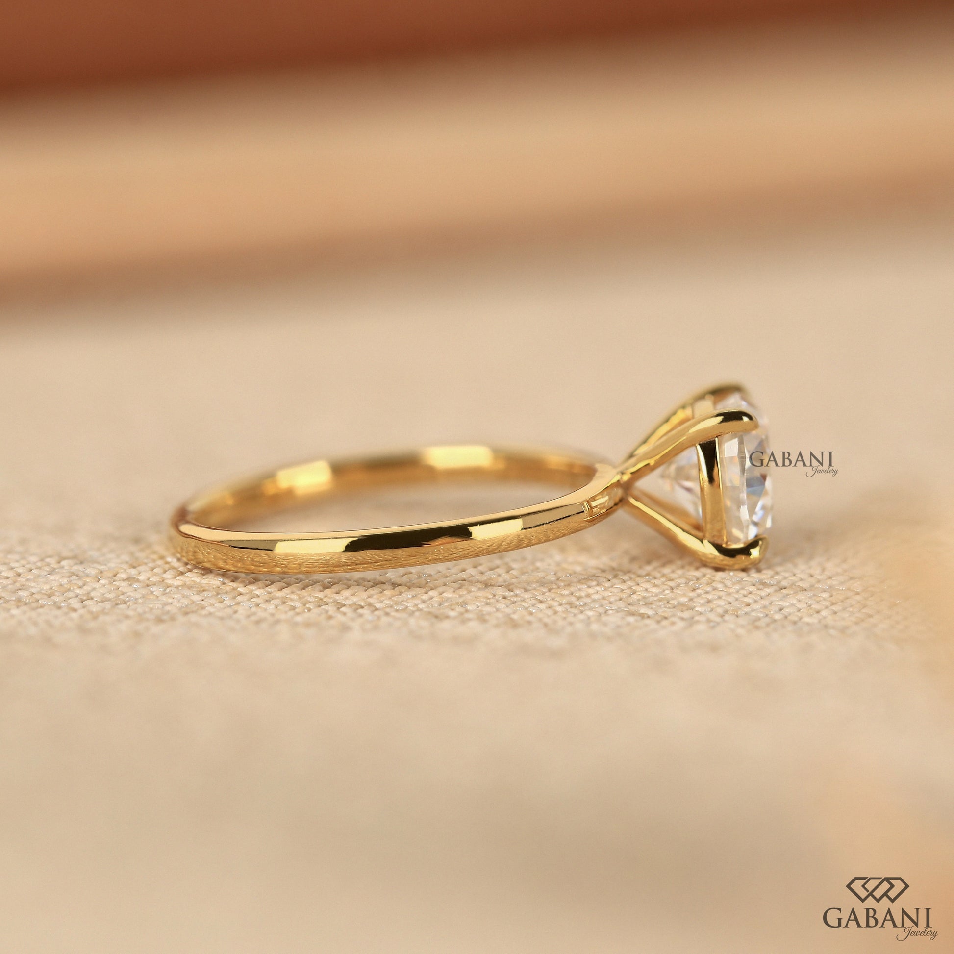 cushion cut lab grown diamond proposal ring in solitaire setting