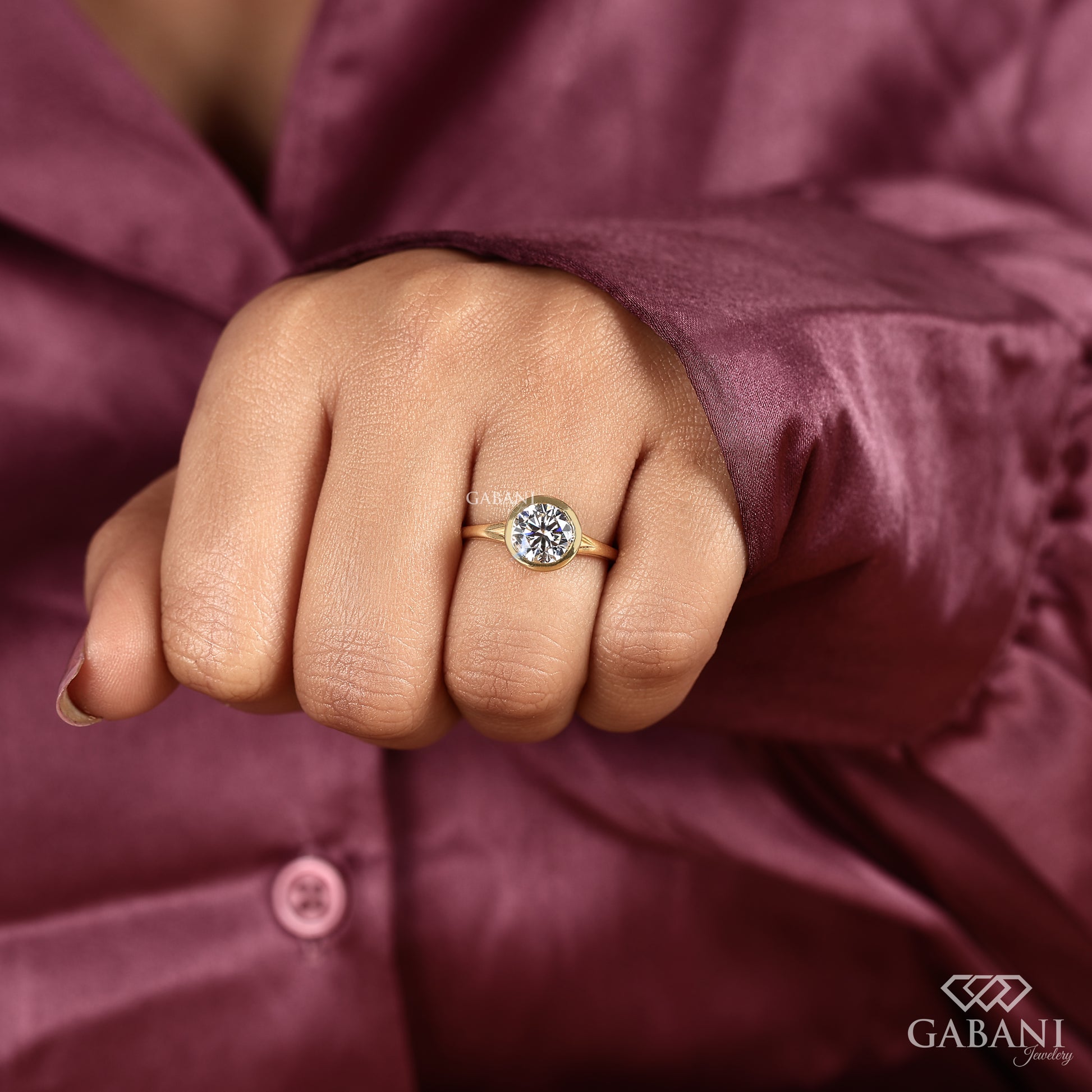 Simple yellow gold bezel set round lab grown diamond solitaire ring