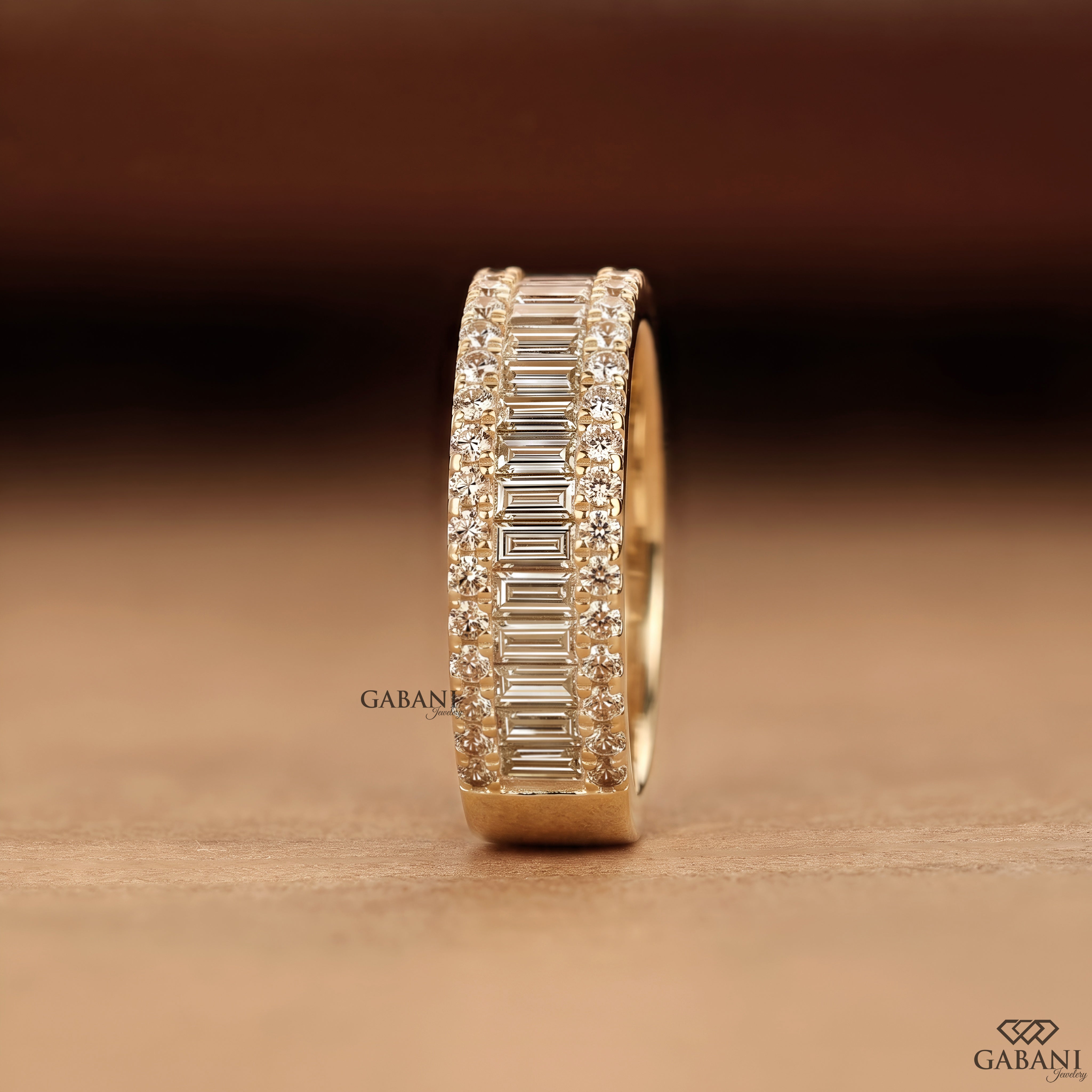 Standing view of Gabani Jewelry wide baguette and round lab grown diamond wedding band