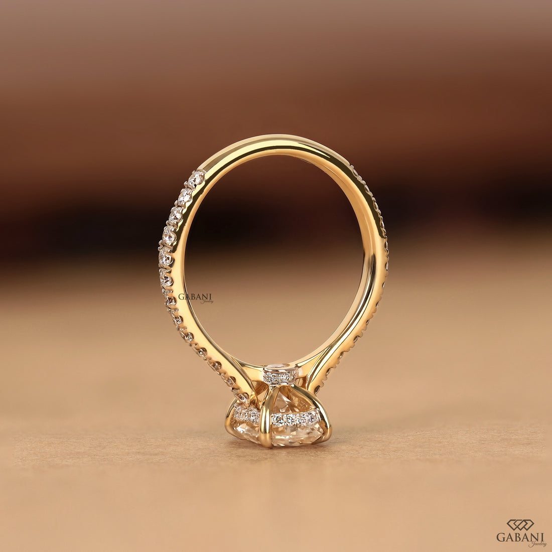Lab grown oval diamond engagement ring with hidden halo