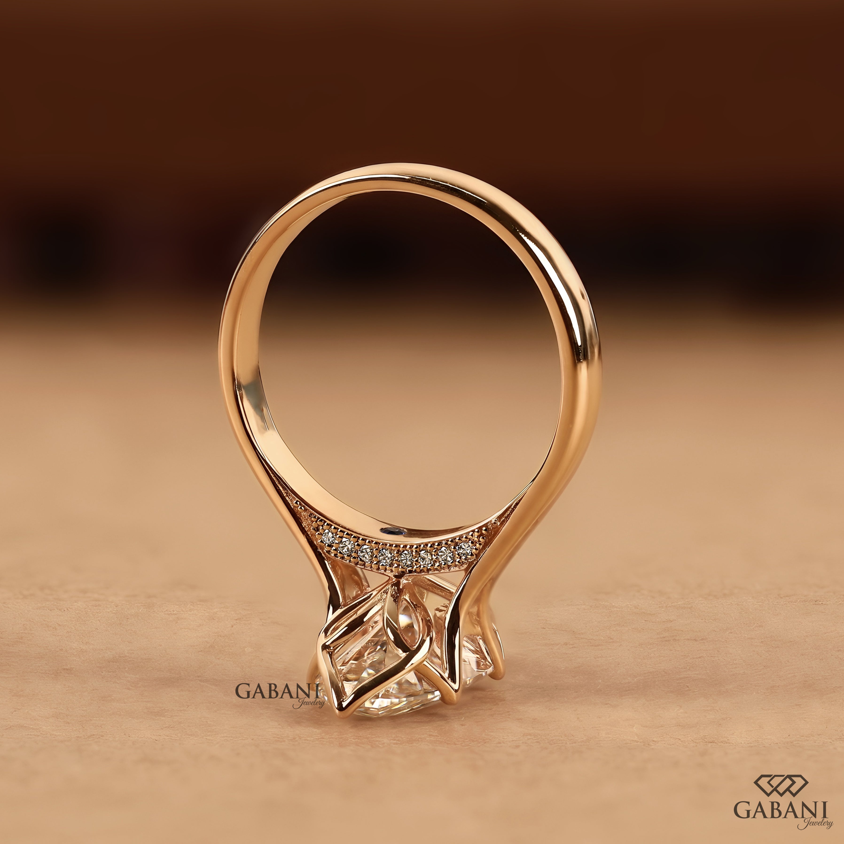 Marquise cut proposal ring featuring an IGI certified lab created diamond