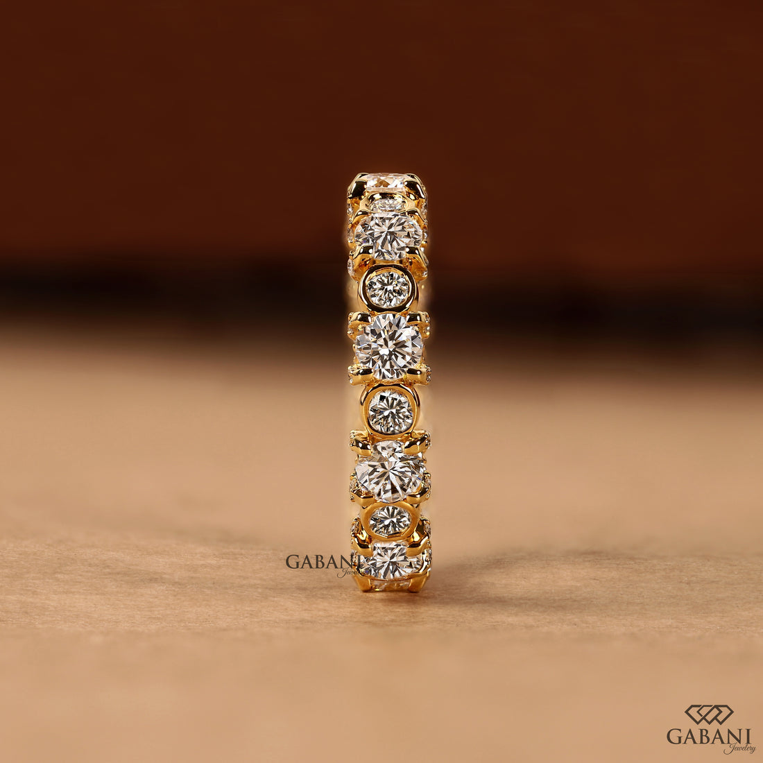 Chunky diamond ring featuring round cut lab grown stones

