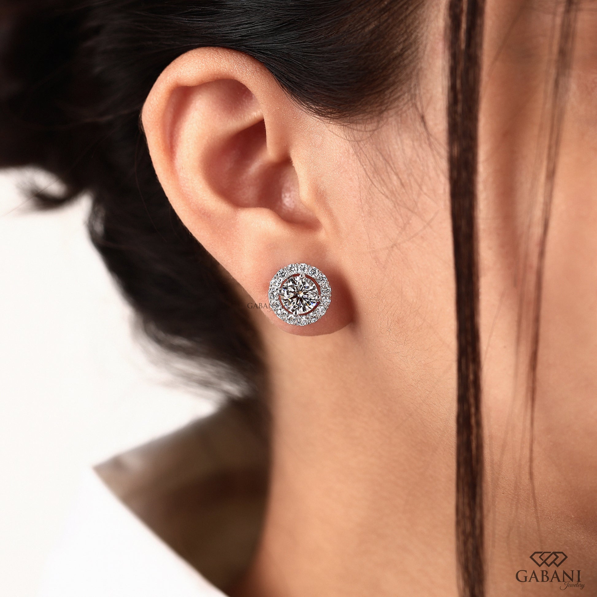 Button prong round lab grown diamond earrings in halo design