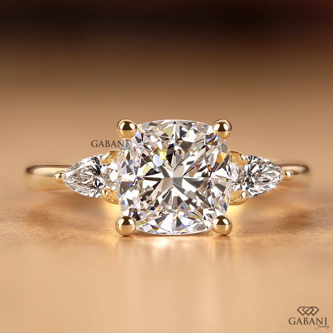 Cushion cut lab grown diamond three stone engagement ring