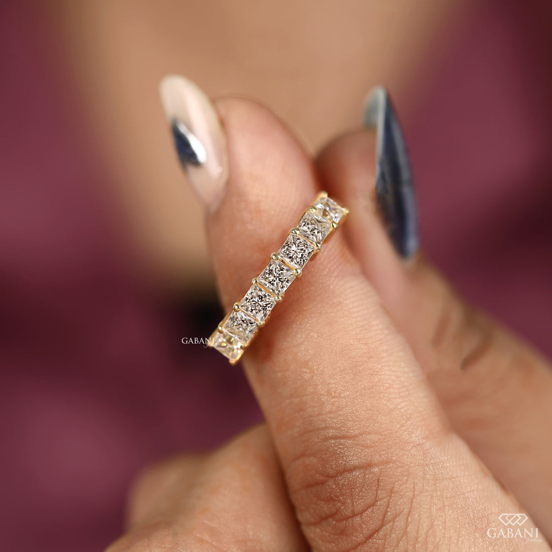 seven stone princess cut lab grown diamond wedding band in 14K yellow gold. A classic half eternity ring for weddings, anniversaries and stacking.