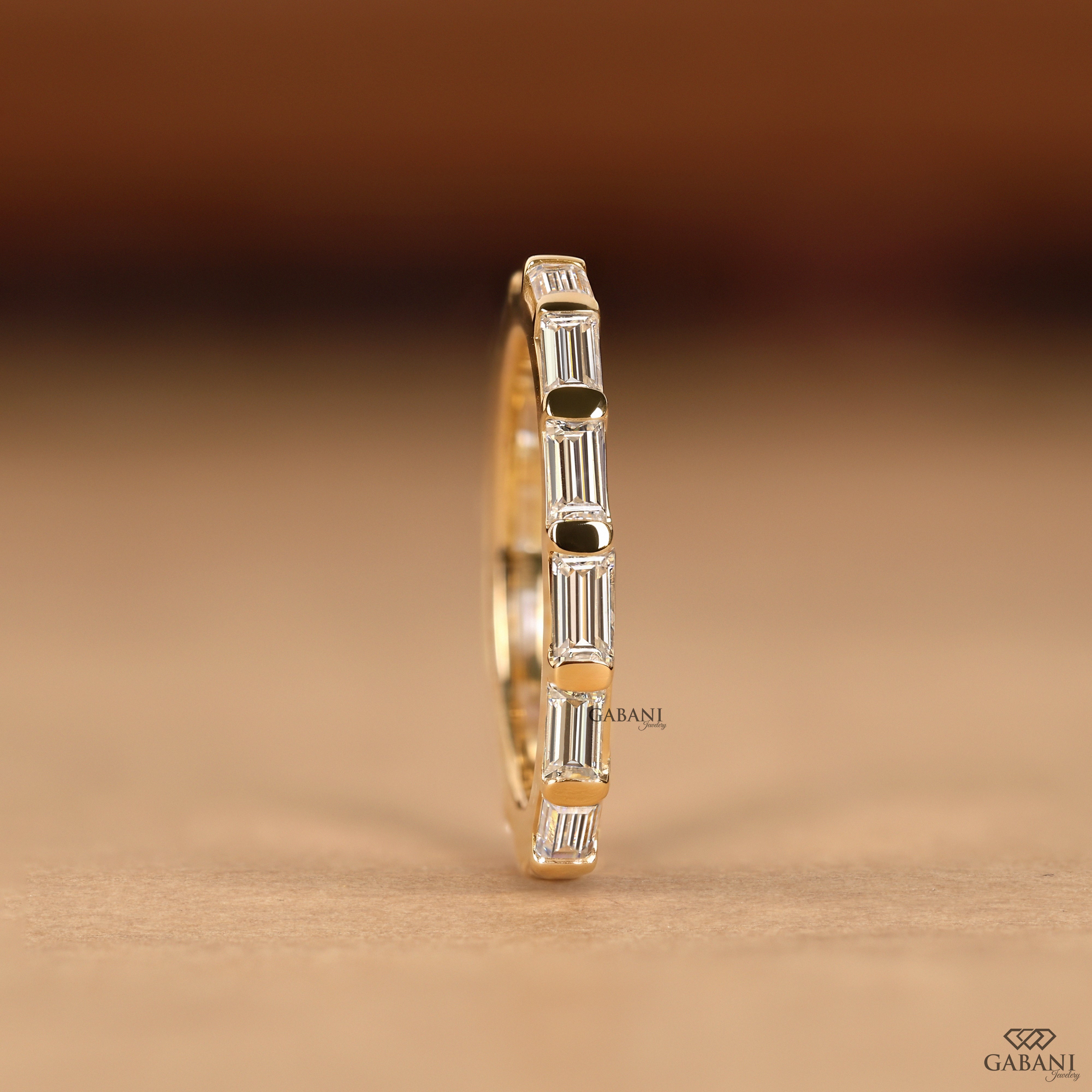 Lab grown diamond eternity band with baguette stones by Gabani Jewelry