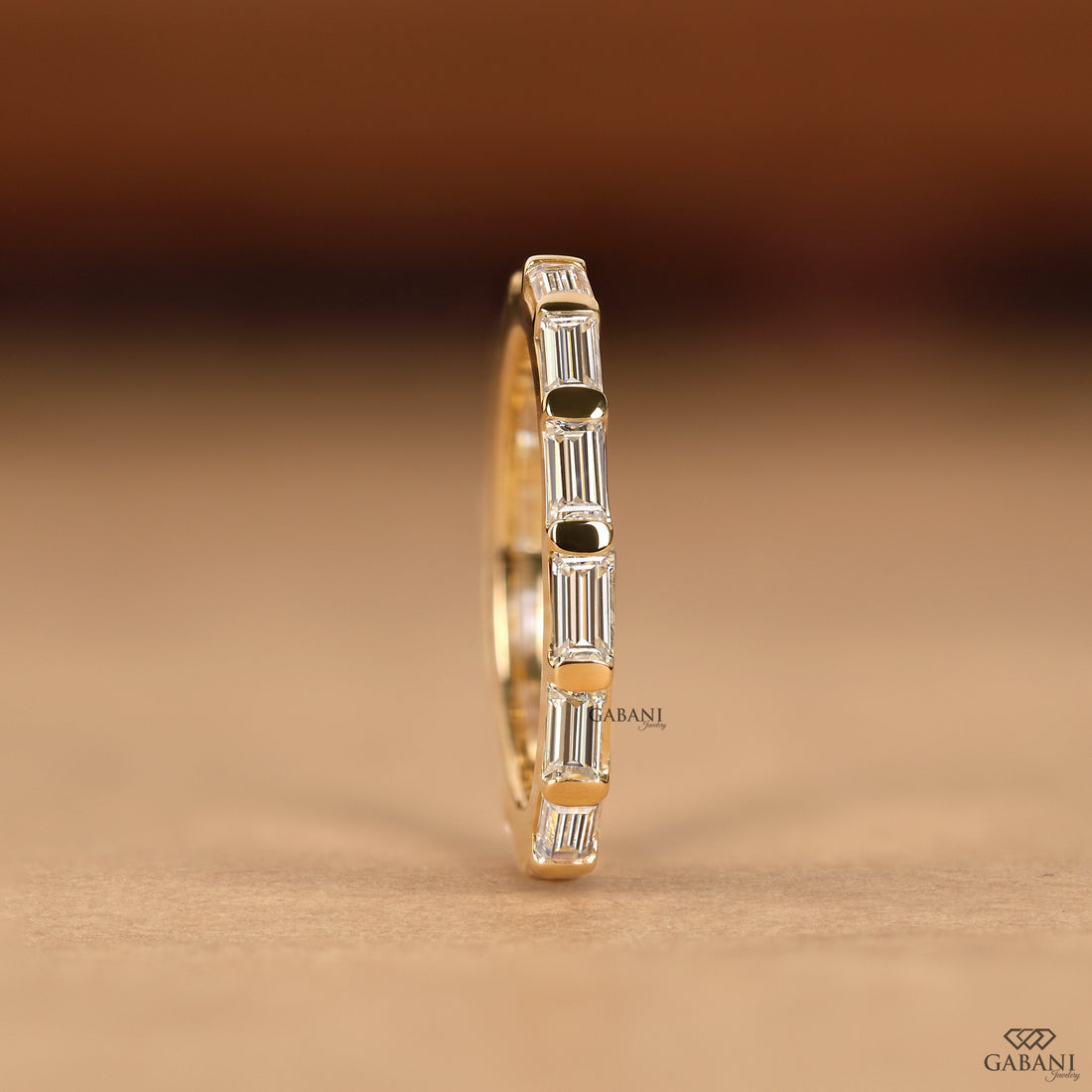 Lab grown diamond eternity band with baguette stones by Gabani Jewelry