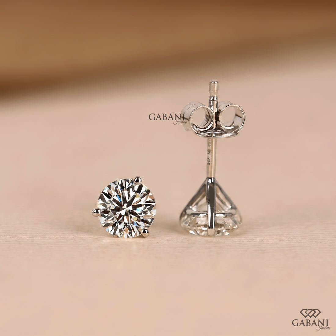 White gold solitaire stud earrings featuring round cut natural diamonds for women
