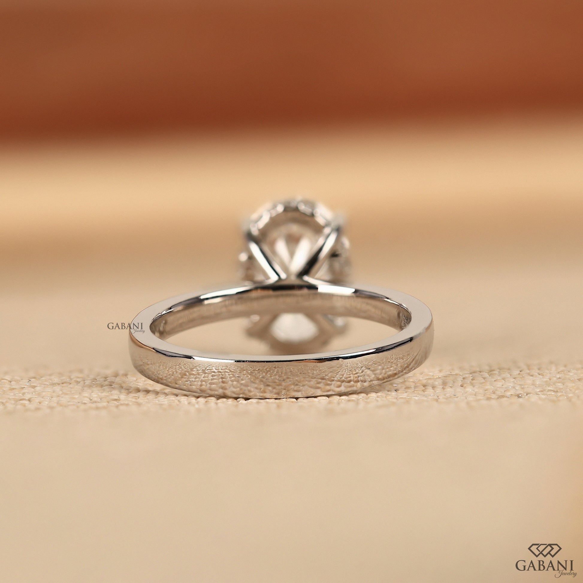 lab grown oval diamond solitaire ring with secure basket setting