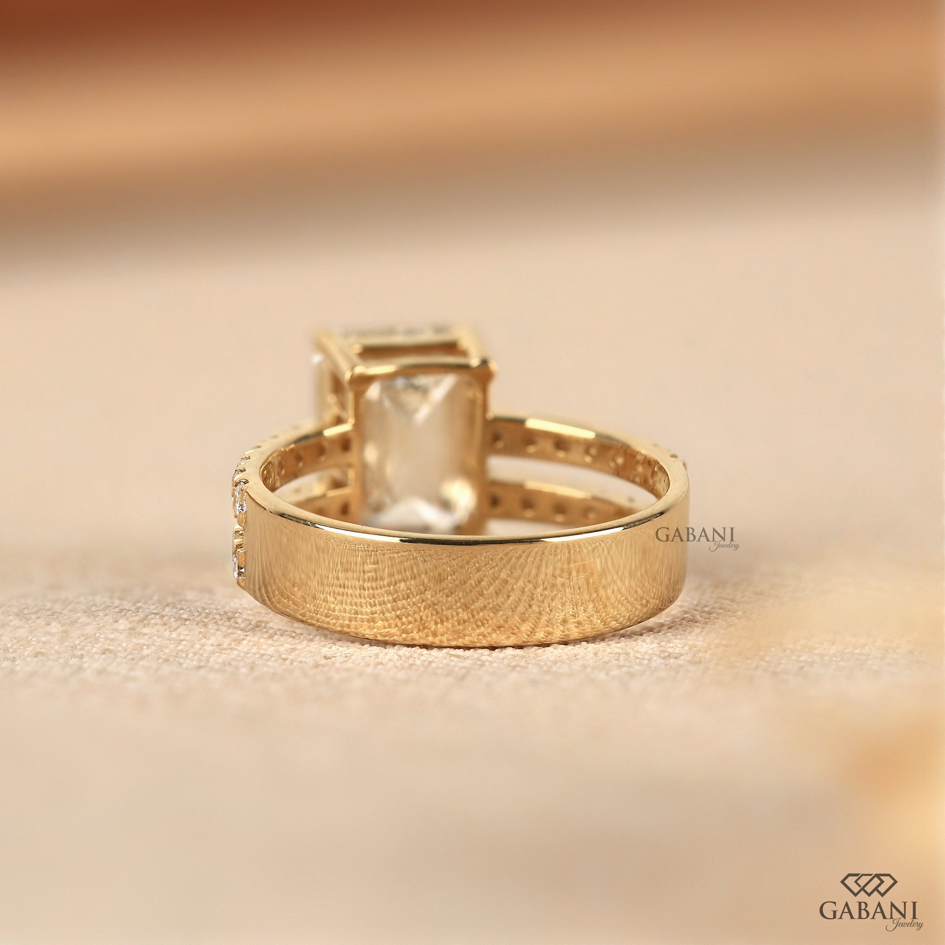 Emerald cut lab diamond ring with secure claw prong setting
